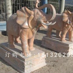象鼻向上大象石雕，晚霞紅大象雕塑